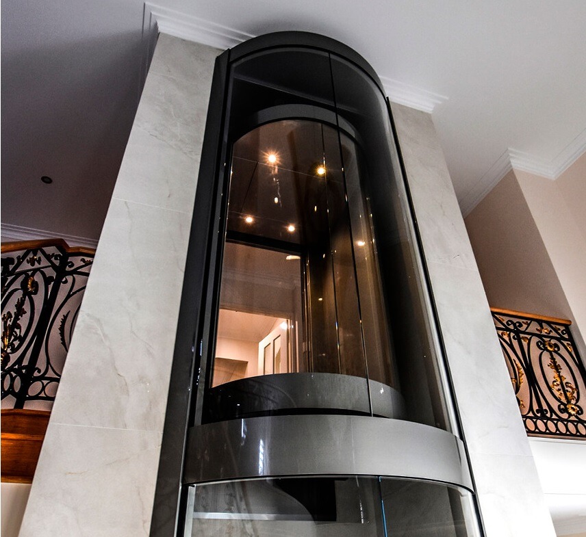 Glass Elevators Pros and Cons: Elevators with transparent walls or floors, offering a scenic view as passengers travel between floors.